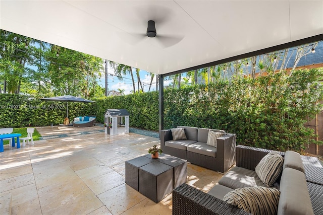 view of patio / terrace with an outdoor hangout area, ceiling fan, and a fenced backyard