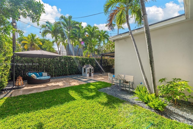 view of yard with fence and a patio area