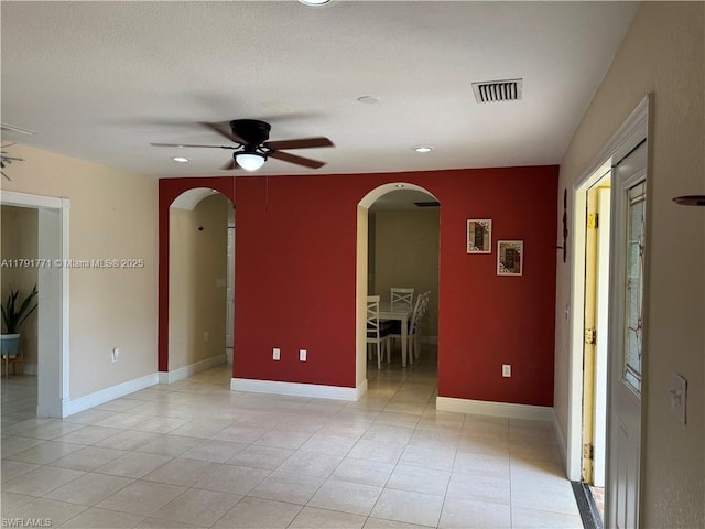 1127 Foggia St E, Lehigh Acres, FL 33974 - spare room featuring light tile patterned floors, visible vents, ceiling fan, and recessed lighting