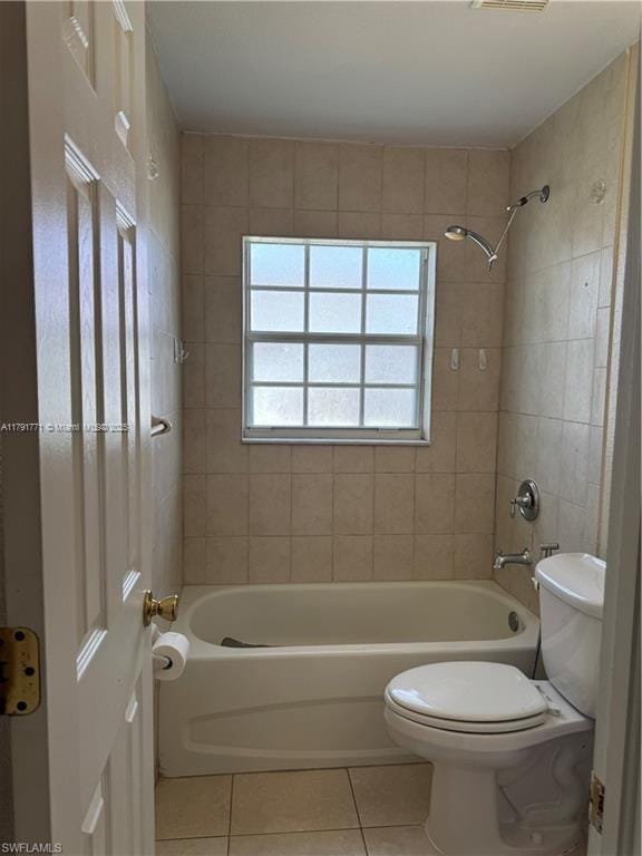 1127 Foggia St E, Lehigh Acres, FL 33974 - full bath featuring toilet, tile patterned flooring, shower / bathtub combination, and visible vents