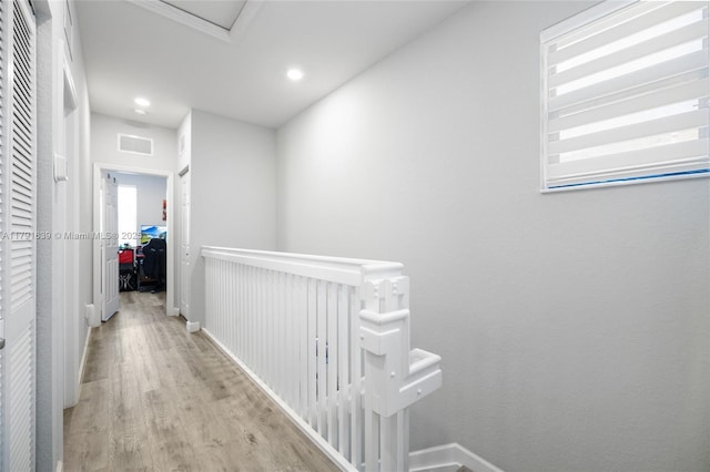 3289 W 106th Ter, Hialeah, FL 33018 - corridor featuring recessed lighting, an upstairs landing, visible vents, and light wood-style floors