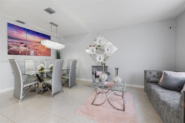 3289 W 106th Ter, Hialeah, FL 33018 - tiled dining area featuring baseboards and visible vents