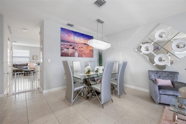3289 W 106th Ter, Hialeah, FL 33018 - dining area featuring light tile patterned floors, visible vents, and baseboards
