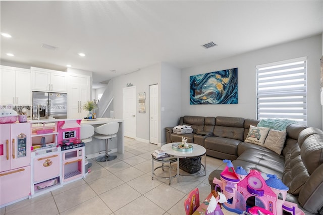 3289 W 106th Ter, Hialeah, FL 33018 - living room with stairway, visible vents, baseboards, light tile patterned flooring, and recessed lighting