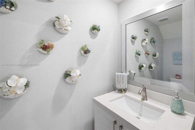 3289 W 106th Ter, Hialeah, FL 33018 - bathroom featuring visible vents and vanity