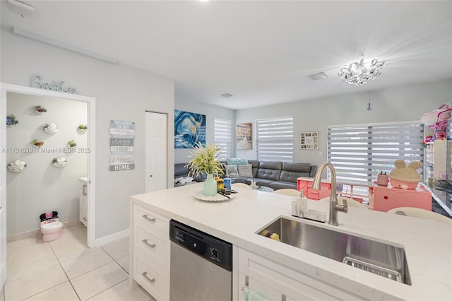 3289 W 106th Ter, Hialeah, FL 33018 - kitchen featuring dishwasher, a sink, white cabinetry, visible vents, and open floor plan