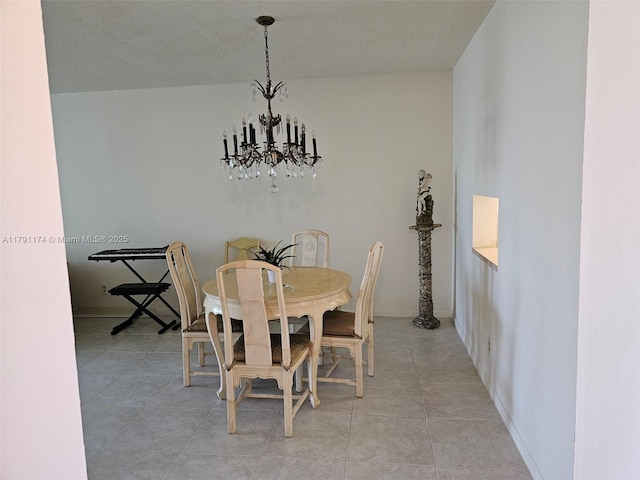 1103 NW 58th Ter Unit 321, Sunrise, FL 33313 - dining space featuring a chandelier and light tile patterned floors