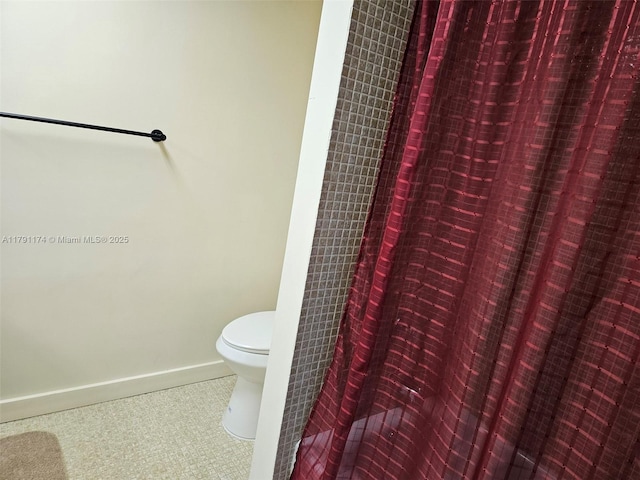 1103 NW 58th Ter Unit 321, Sunrise, FL 33313 - full bathroom featuring toilet and baseboards