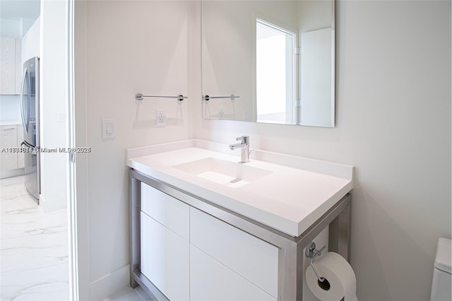2000 Metropica Way Unit 2605, Sunrise, FL 33323 - bathroom with marble finish floors, vanity, and toilet