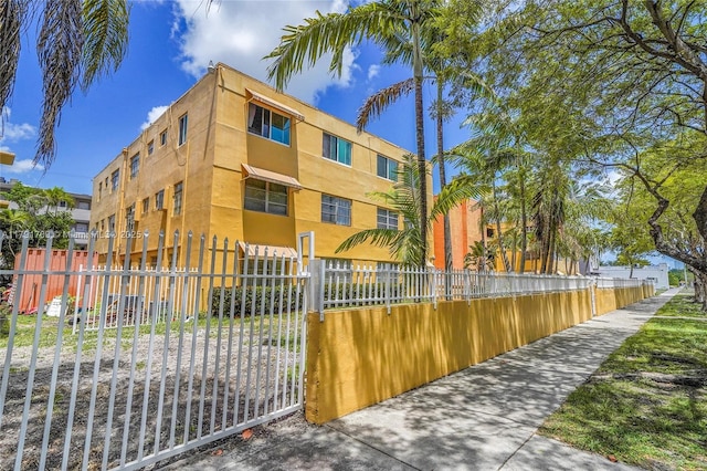 view of property featuring a fenced front yard