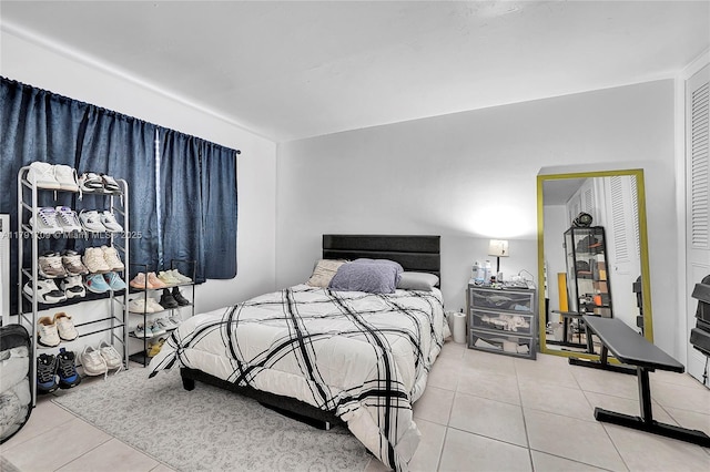 bedroom featuring tile patterned flooring