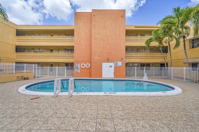 pool featuring fence