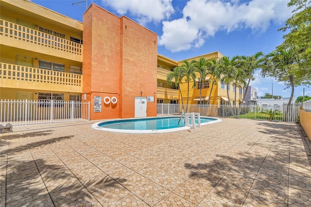 pool featuring fence
