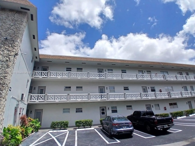 4805 NW 35th St Unit 610, Lauderdale Lakes, FL 33319 - view of apartment building / complex with uncovered parking