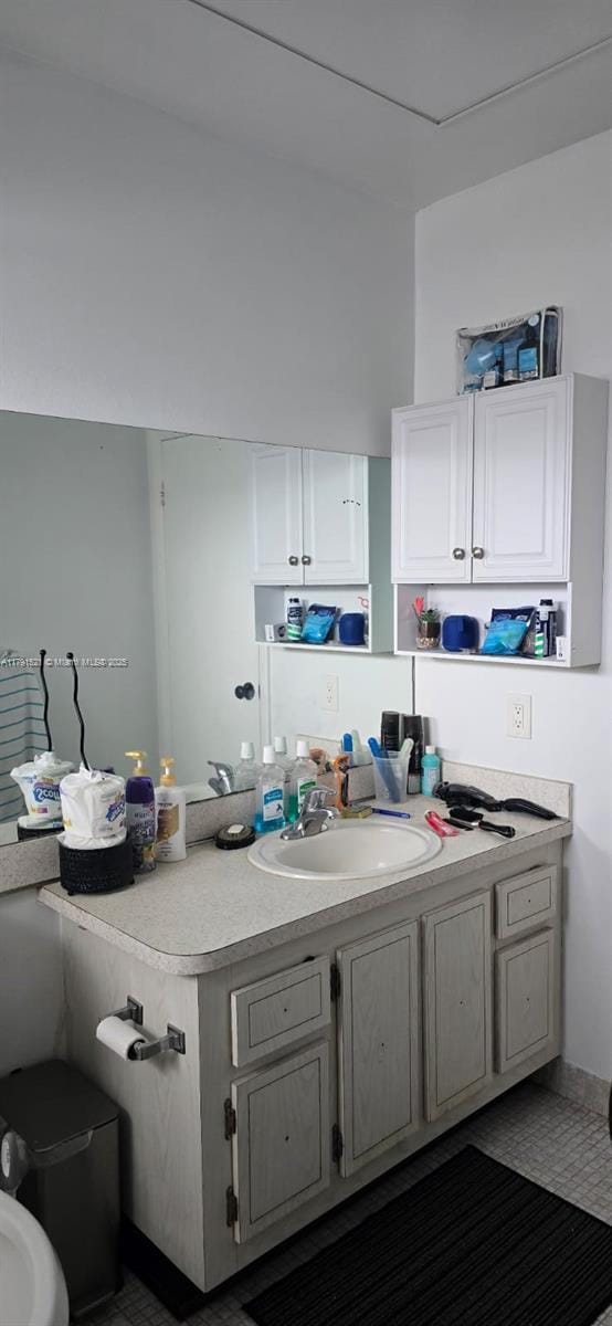 4805 NW 35th St Unit 610, Lauderdale Lakes, FL 33319 - kitchen featuring light countertops and white cabinets