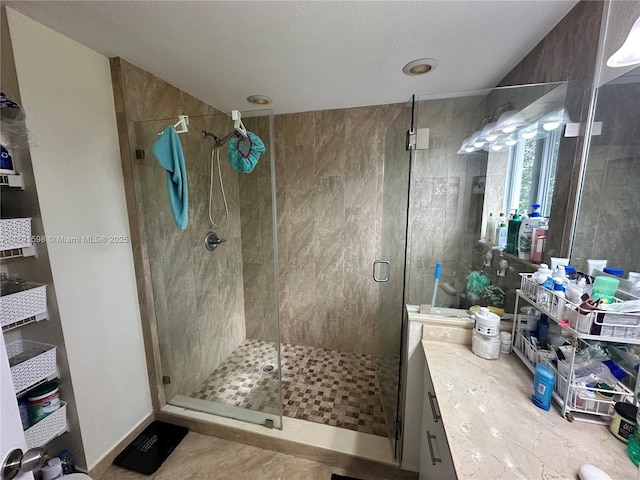 212 NE 3rd St Unit 12, Hallandale Beach, FL 33009 - bathroom featuring vanity and a shower stall