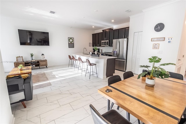 dining room with recessed lighting, marble finish floor, and visible vents