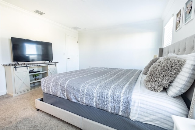 bedroom with visible vents, carpet, and crown molding
