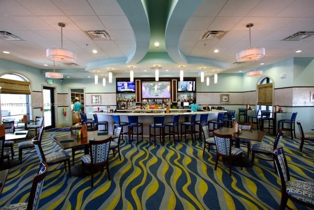 carpeted dining area featuring visible vents and recessed lighting