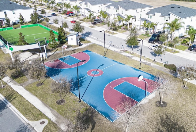 view of basketball court featuring a residential view