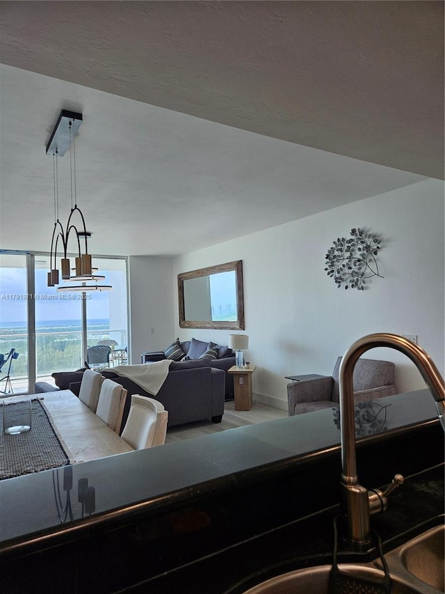 living room featuring baseboards
