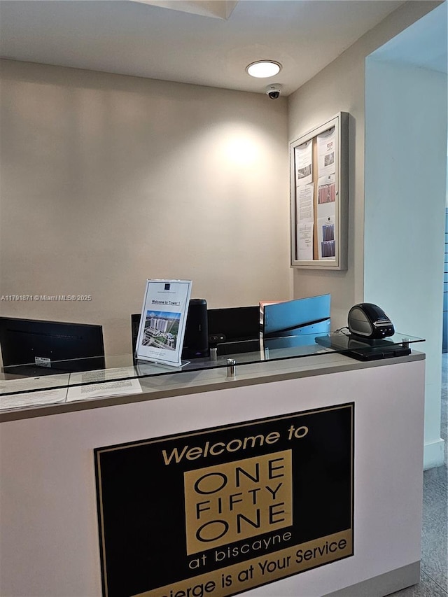 15051 Royal Oaks Ln Unit 2202, North Miami, FL 33181 - reception area with a security system