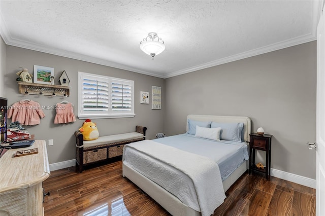 bedroom with wood finished floors, ornamental molding, and baseboards