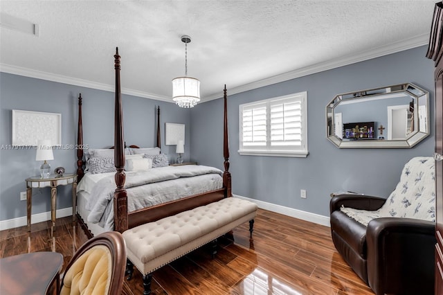 bedroom with a textured ceiling, baseboards, an inviting chandelier, ornamental molding, and wood finished floors