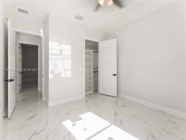 923 Winters St E, Lehigh Acres, FL 33974 - unfurnished bedroom with baseboards and visible vents