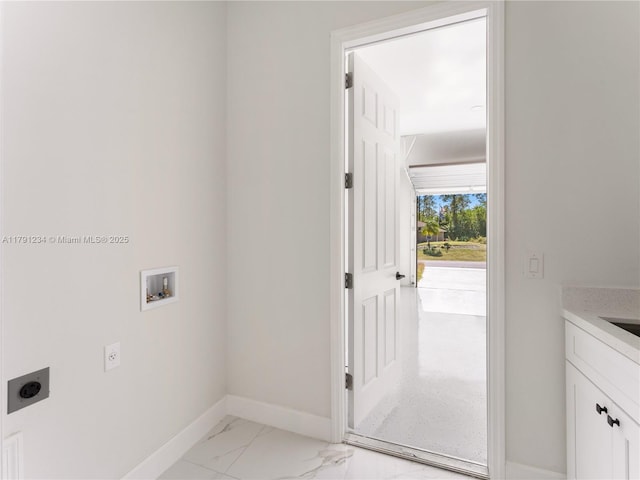 923 Winters St E, Lehigh Acres, FL 33974 - laundry room with hookup for a washing machine, cabinet space, hookup for an electric dryer, marble finish floor, and baseboards
