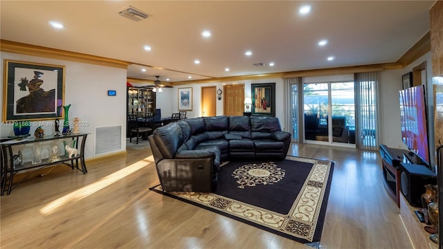 living room featuring recessed lighting, visible vents, ceiling fan, and wood finished floors