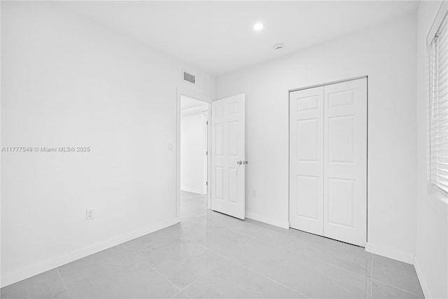 240 NW 127th St, North Miami, FL 33168 - unfurnished bedroom featuring recessed lighting, a closet, visible vents, and baseboards
