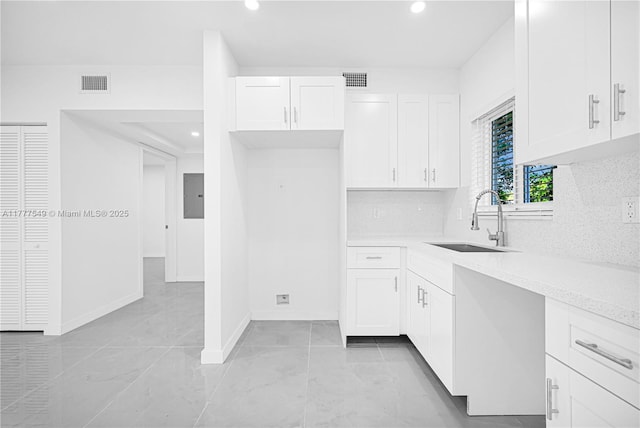 240 NW 127th St, North Miami, FL 33168 - kitchen with visible vents, recessed lighting, electric panel, and a sink