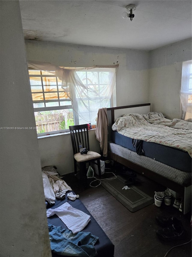 bedroom featuring wood finished floors