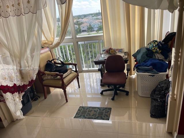 4400 Hillcrest Dr Unit 701B, Hollywood, FL 33021 - living area featuring tile patterned floors