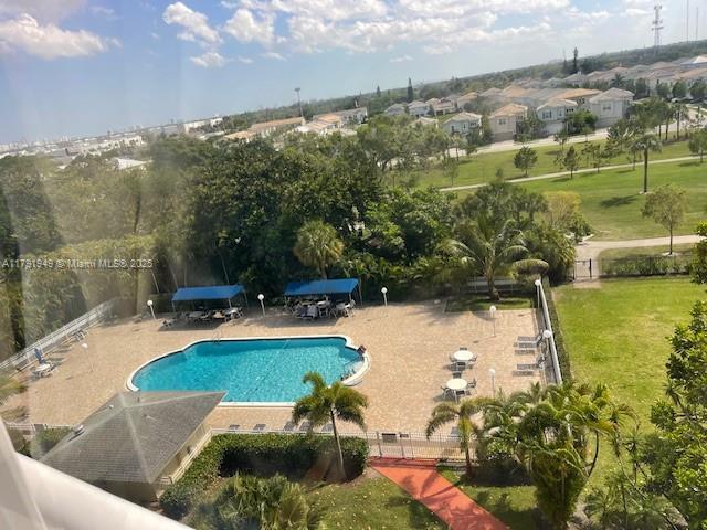 4400 Hillcrest Dr Unit 701B, Hollywood, FL 33021 - pool featuring a yard, a patio, and fence