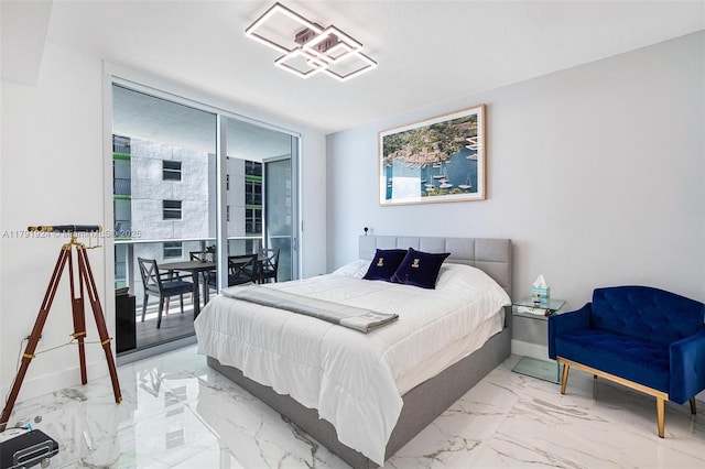 488 NE 18th St Unit 1708, Miami, FL 33132 - bedroom featuring baseboards, access to exterior, expansive windows, and marble finish floor