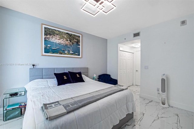 488 NE 18th St Unit 1708, Miami, FL 33132 - bedroom with visible vents, a closet, marble finish floor, and baseboards