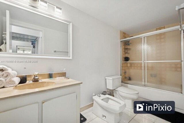 2500 Parkview Dr Unit 1816, Hallandale Beach, FL 33009 - bathroom with tile patterned floors, a bidet, enclosed tub / shower combo, toilet, and vanity