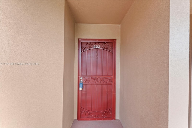 300 SW 130th Ter Unit 203B, Pembroke Pines, FL 33027 - doorway to property with stucco siding
