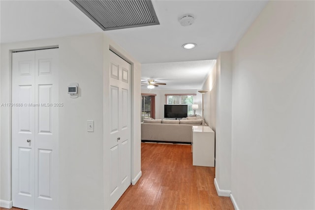 300 SW 130th Ter Unit 203B, Pembroke Pines, FL 33027 - corridor with light wood-style floors, baseboards, and recessed lighting