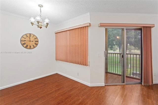300 SW 130th Ter Unit 203B, Pembroke Pines, FL 33027 - empty room featuring wood finished floors, a chandelier, baseboards, a textured ceiling, and crown molding
