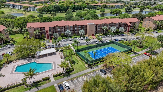 300 SW 130th Ter Unit 203B, Pembroke Pines, FL 33027 - bird's eye view of apartment complex, a nearby body of water, and a pool area