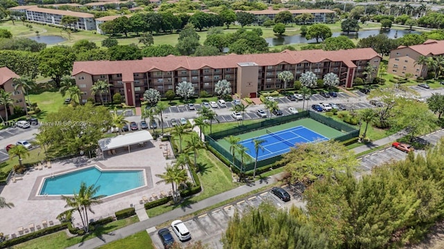 300 SW 130th Ter Unit 203B, Pembroke Pines, FL 33027 - drone / aerial view of apartment complex, a nearby body of water, and a pool