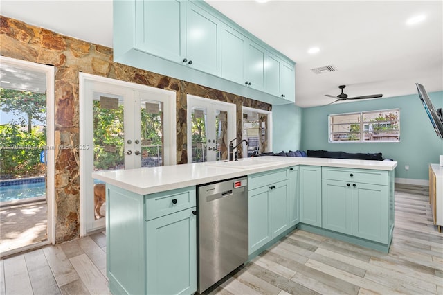 3030 SW 77th Ct, Miami, FL 33155 - kitchen featuring french doors, a healthy amount of sunlight, stainless steel dishwasher, and a sink