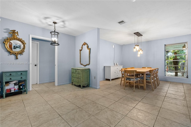 3030 SW 77th Ct, Miami, FL 33155 - dining area featuring light tile patterned floors, an inviting chandelier, visible vents, and baseboards