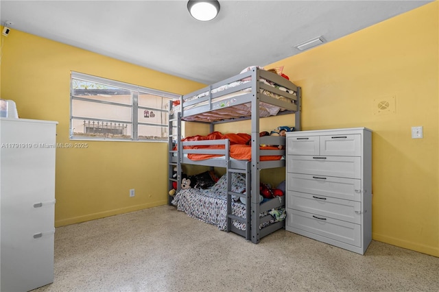 3030 SW 77th Ct, Miami, FL 33155 - bedroom featuring visible vents, speckled floor, and baseboards
