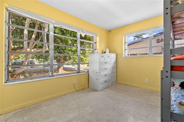 3030 SW 77th Ct, Miami, FL 33155 - bedroom featuring speckled floor and baseboards
