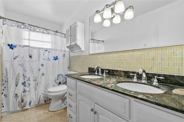 3030 SW 77th Ct, Miami, FL 33155 - bathroom with tasteful backsplash, toilet, speckled floor, and a sink