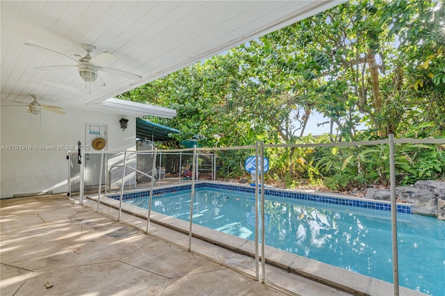 3030 SW 77th Ct, Miami, FL 33155 - view of swimming pool featuring a ceiling fan, a fenced in pool, and fence